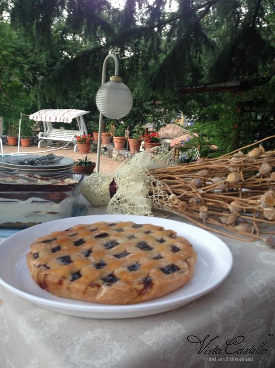 Colazione in giardino - B&B Vista Castello